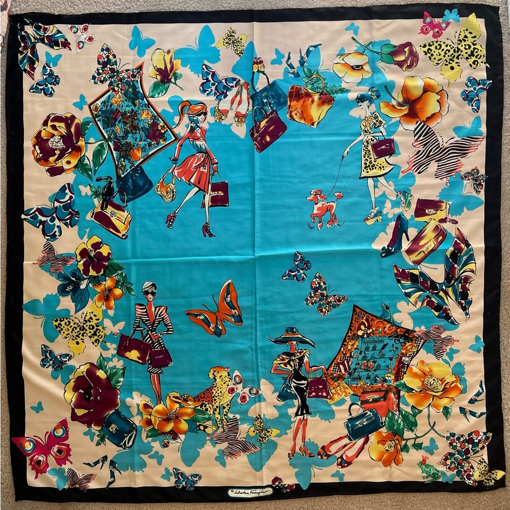 New Salvatore Ferragamo hand rolled silk scarf.